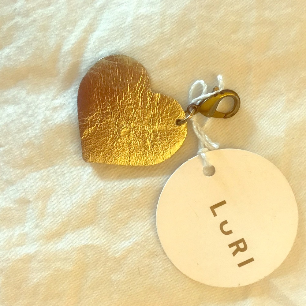 Metallic gold leather charm